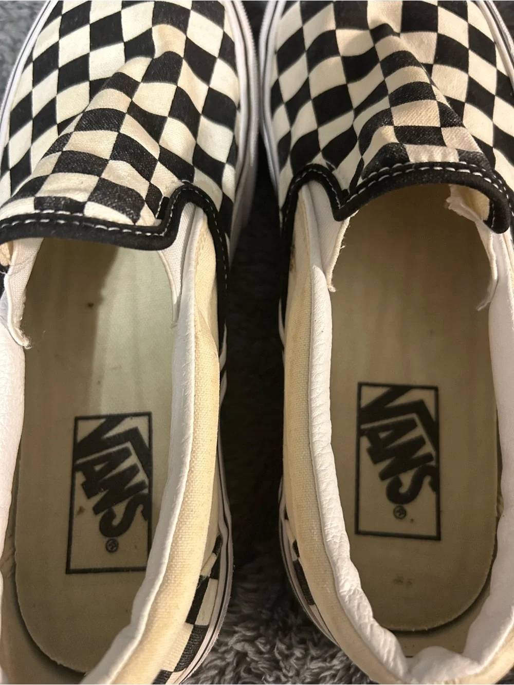 Vans Checkerboard Slip-On Sneakers in Black and White